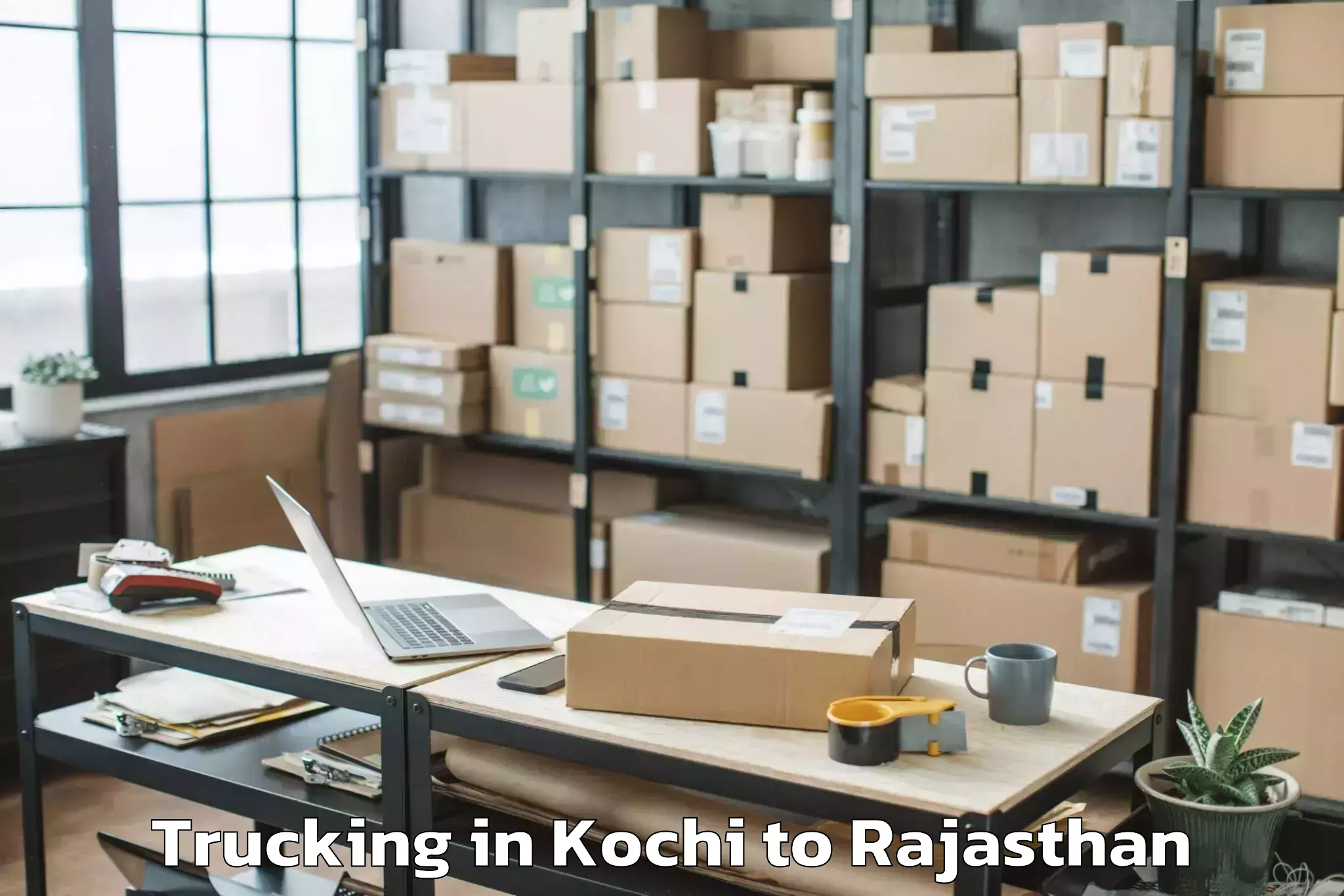 Book Kochi to Kherwara Trucking Online